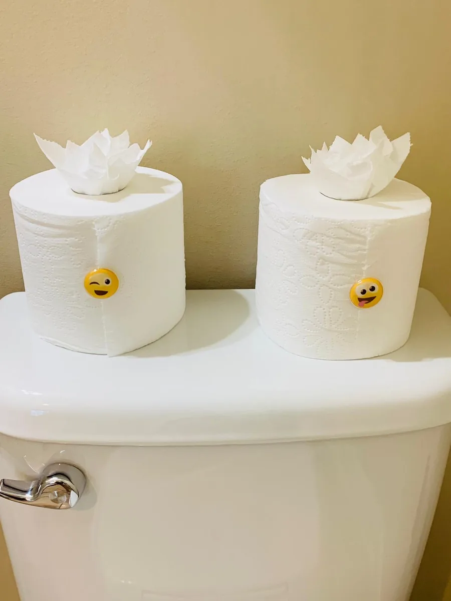 Paper folded into flowers and finished with stickers by Dolane Cleaning Services
